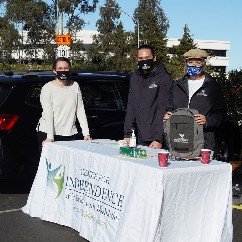 Photo with CID staff from a food distrubution event (2020).